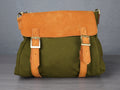 Green and orange bag on a gray surface with a plain background